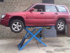 CAR LIFT, MOBILE SCISSOR LIFT.   3 YEAR WARRANTY.       GREAT FOR HOME/WORK USE 
