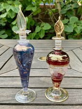 Pair of Egyptian glass perfume bottles with stoppers/dabbers collectables