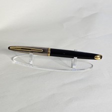 Waterman Carene fountain pen.  Black with Gold trim and Silver plated cap.