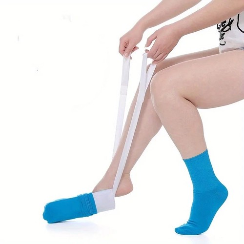 Sock aid tool for - for, putting