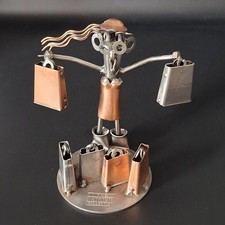 6" 465g 'ATRIUM' METAL RECYCLING RUSTIC WOMAN WITH SHOPPING BAGS. 191