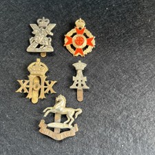 Five Cap Badges