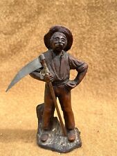 VINTAGE BRONZED RESIN FIGURINE OF A FARMER WITH SCYTHE GRASS CUTTER 