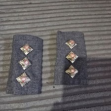 Pair of british army officer captain metal pips