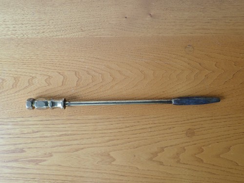 Vintage solid brass poker 28cm