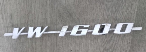 1600 rear badge - badge, script