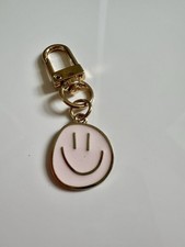 Smiley Face Bag Charm. Baby Pink.