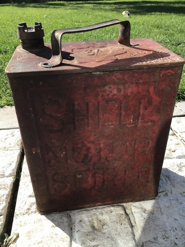 Vintage shell red fuel can - red,