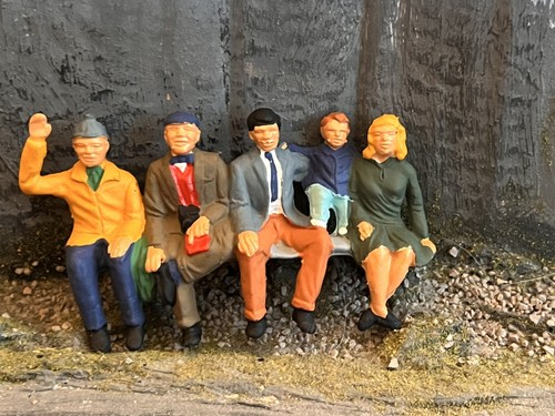Painted seated spectators - painted,