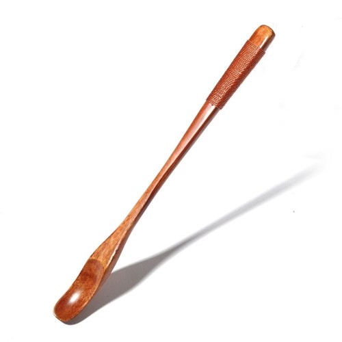 Wooden spoon with long - long, thin