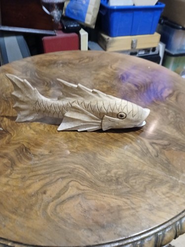 Hand carved wooden fish - hand,