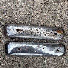 A PAIR OF MORRIS MINOR TRAVELLER REAR BUMPER CHROME BLADES WITH FIXING BOLTS