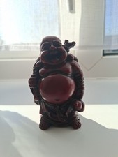 Red resin laughing happy - red,