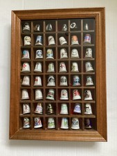 Thimble display cabinet with