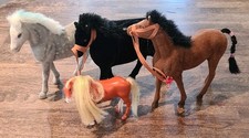 BUNDLE OF 4 VINTAGE TOY HORSES