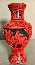 A Chinese carved red cinnabar