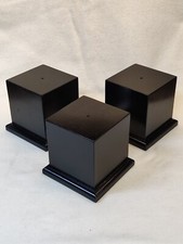 Three wooden trophy bases.