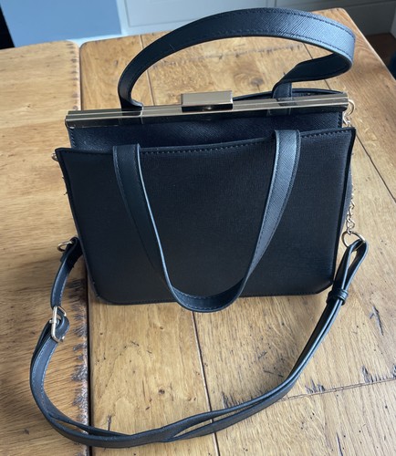 Black handbag - black,
