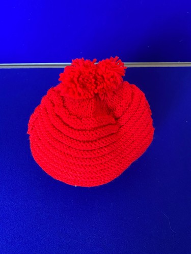 Red hand knitted tea - hand,