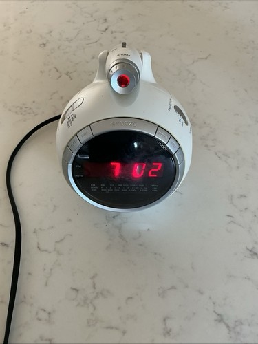 Projection alarm clock - with, fm
