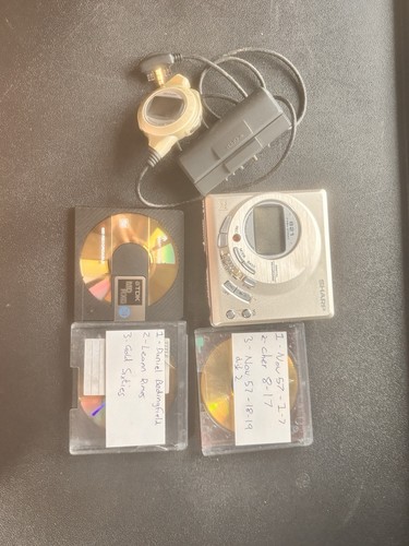Sharp portable minidisc player - sharp,