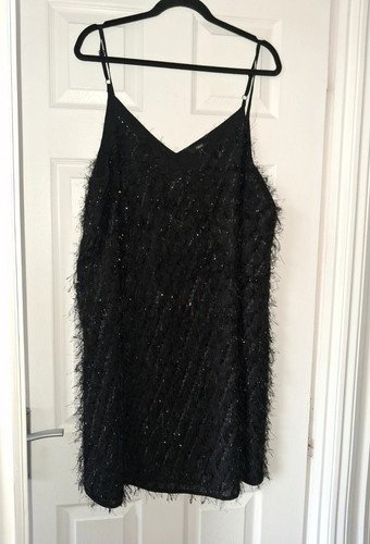 Bnwt next black feather - bnwt,