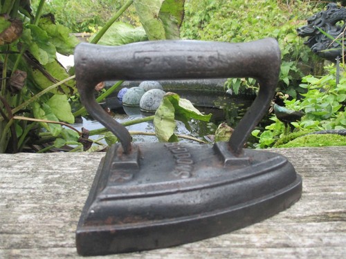 Antique flat iron door stop - antique,