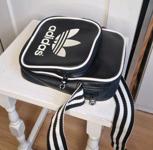 Small black adidas - small, airliner