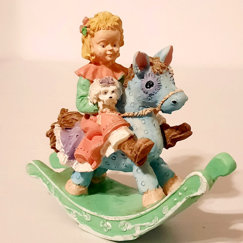 Rocking horse girl figurine - horse,