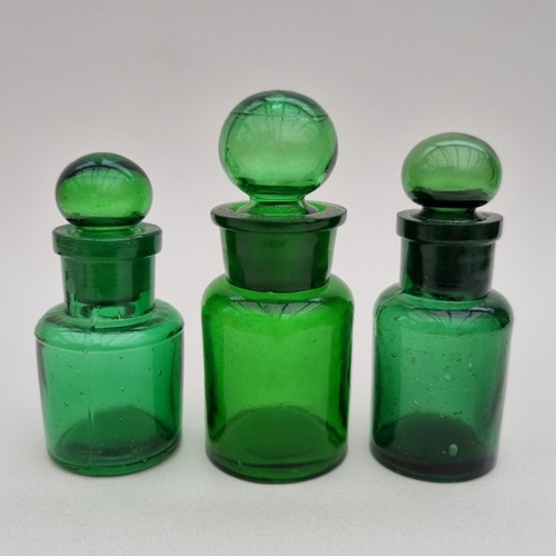 Old green glass bottles - glass,