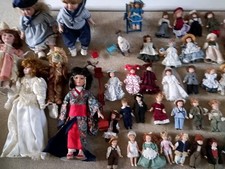 51  Porcelain Dolls 46 x 6"  2 x 17" 3 x 12"  1 Scarecrow