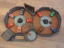 Disney Pixar Crank n Crash Track with 9 Diecast Mini Racer Cars