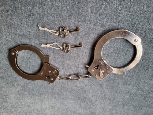 Steel handcuffs with two keys - handcuffs,