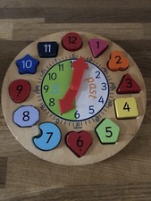 ELC wooden shape sorter tell