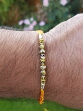 Hindu red thread evil eye