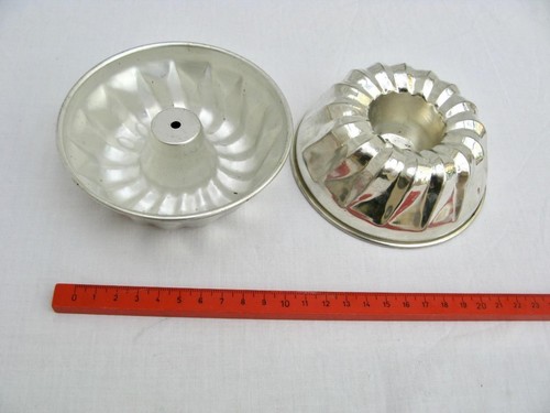 Two jelly moulds - ,, baba