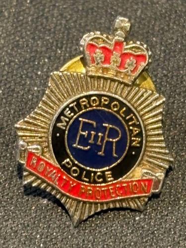 Obsolete lapel badge - badge, the