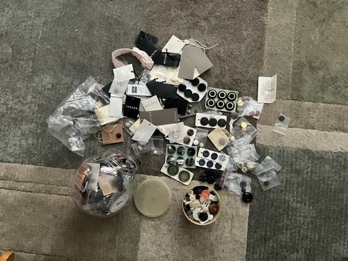 100 buttons including - of,