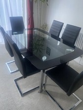 Harvey’s black Glass Dining Table With 2 free Chairs Not 6
