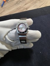 Storm Dranar ladies' silver-tone date quartz watch with a pink dial.