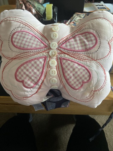 Next pink butterfly shaped - next,