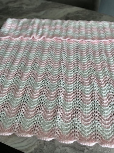Large hand knitted cot pram - hand,