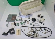 Toyota 940 Sewing Machine parts inc Bobbin plate, feeder plate, presser feet etc