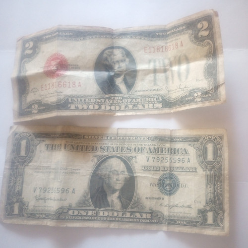 Two old currency - notes, 2
