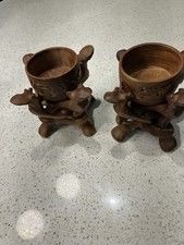 A Pair of Hand Carved 4 Leg