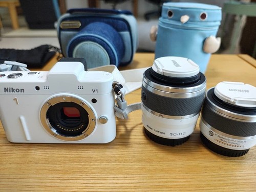 Nikon double zoom - zoom, kit