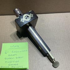 ROSEWOOD AND BRASS SCREW STEM