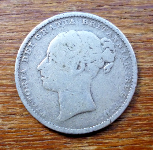 1883 one shilling silver coin - one,