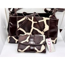 Nine giraffe print - &,