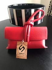 New red leather clutch bag